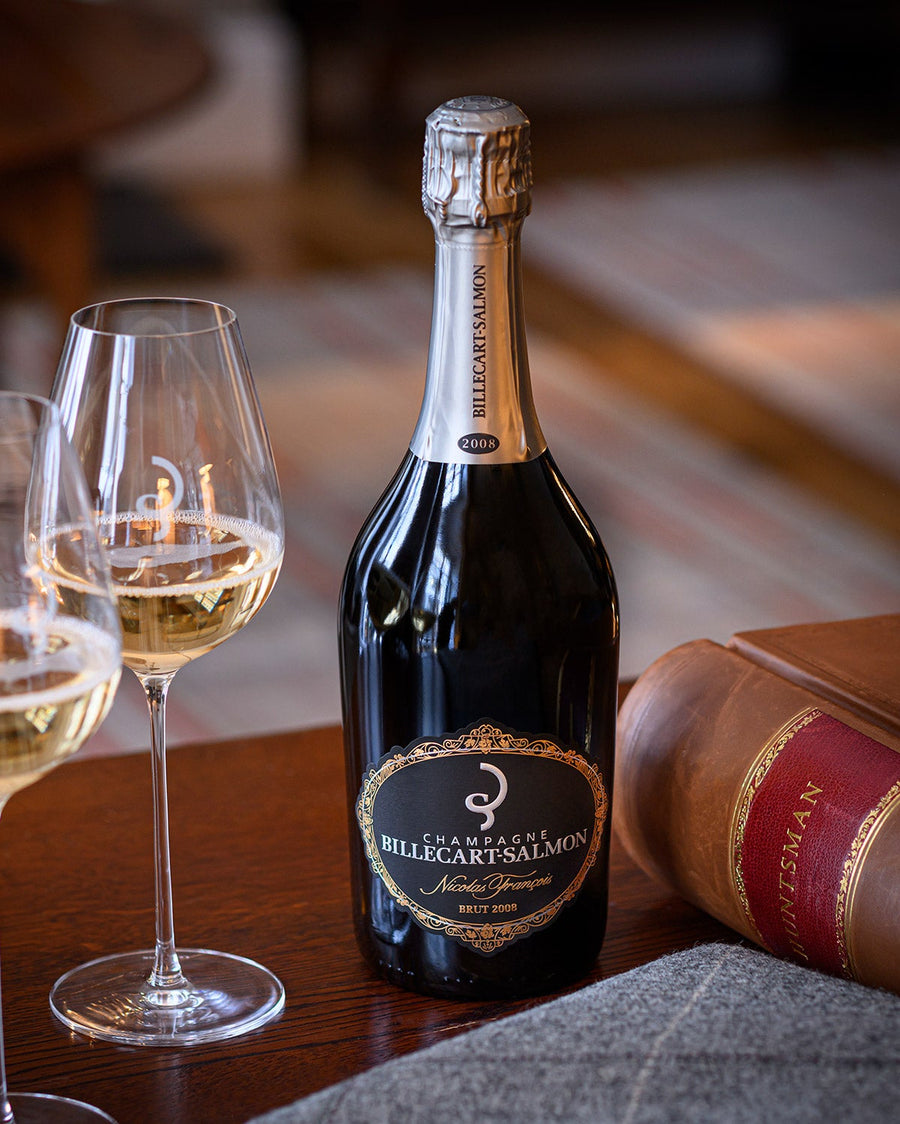 Billecart-Salmon Brut 2008 champagne and crystal glasses at the Huntsman Club bar at 11 Savile Row