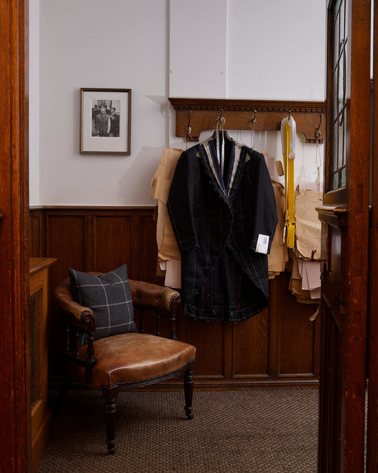 Huntsman bespoke morning wear coat hanging in the fitting room awaiting a client's first fitting at 11 Savile Row